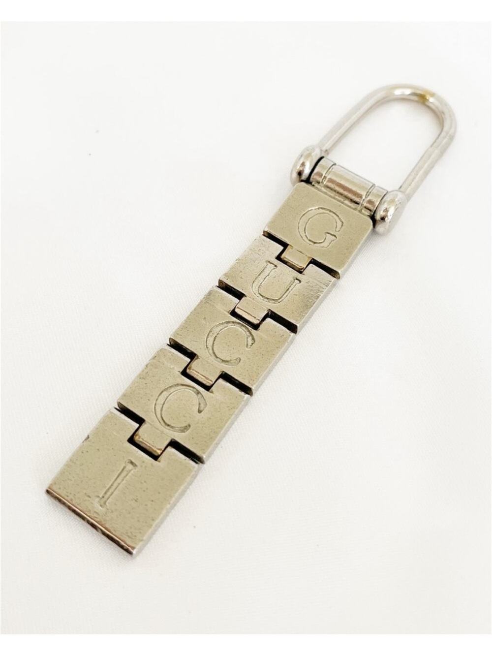 Vintage 1990s Gucci Articulated GUCCI Logo Keychain Silver Tone Made in Italy Ra